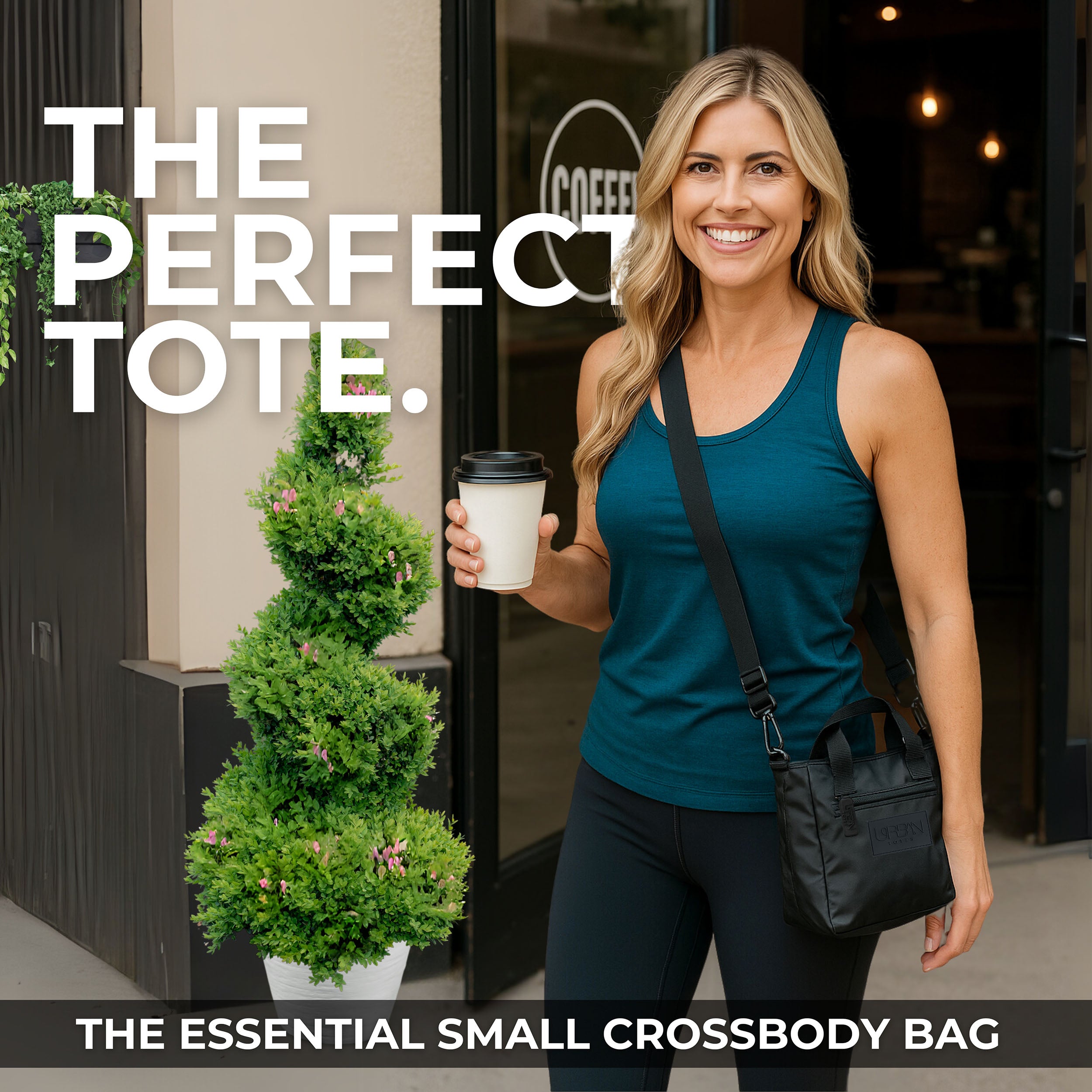 Woman holding a coffee cup with a black crossbody bag, standing in front of a coffee shop.