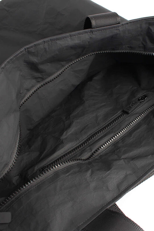 Inside zipper pockets of the daytripper bag