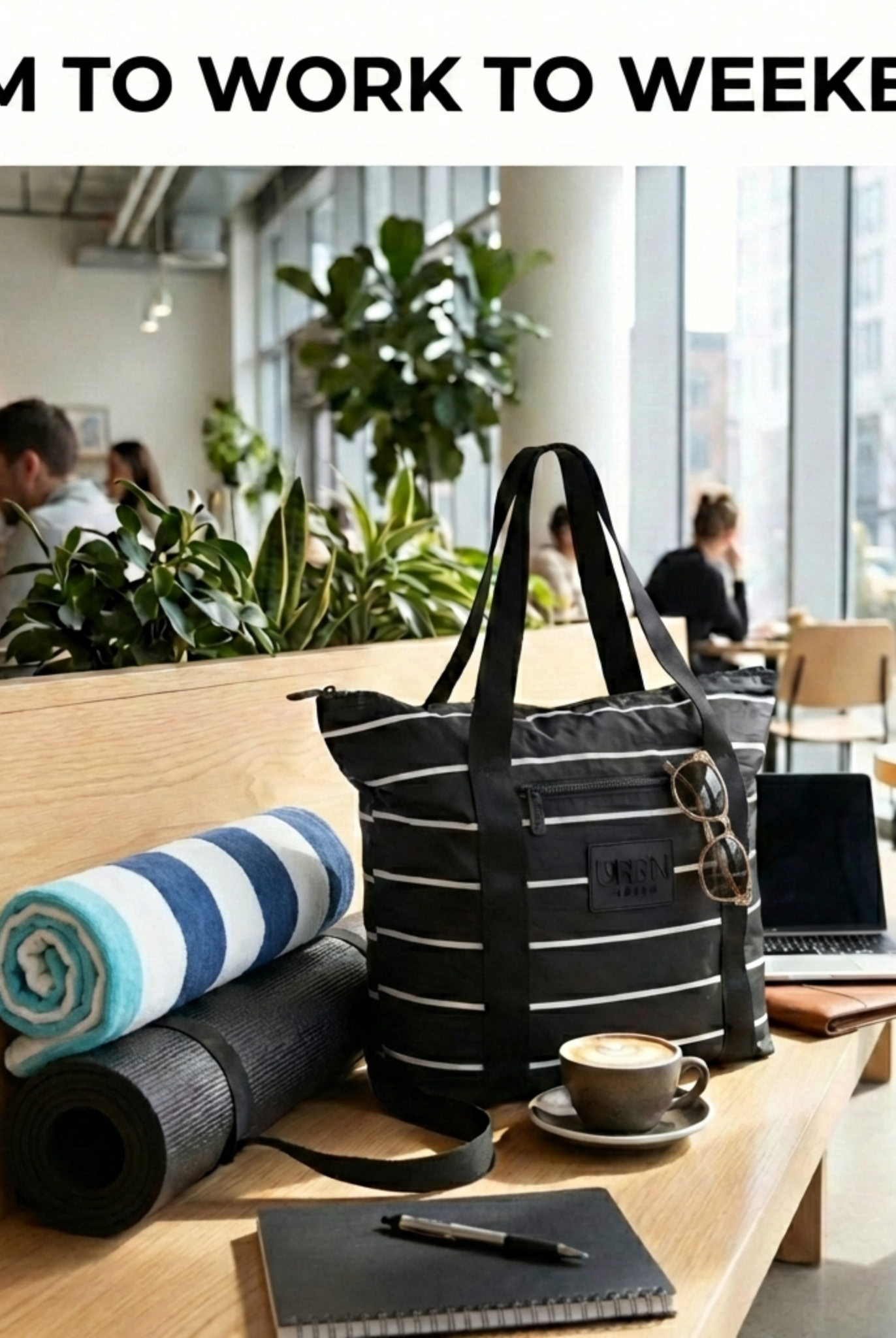 Black tote bag with rolled-up yoga mat to go from the gym to work to weekend adventures.
