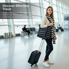Woman with a suitcase and striped bag in an airport terminal, promoting effortless travel.